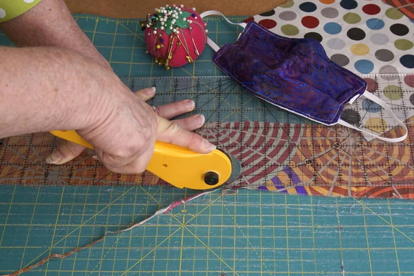 Using Rotary Cutter Cut Leftover Quilting Fabric Hand Sewn Face — Stock Photo, Image