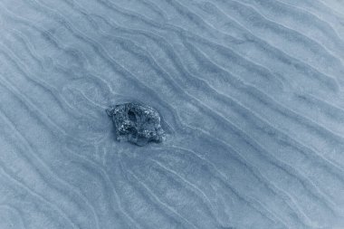 Klasik mavi taşlı deniz yatağı kumunun arka planı