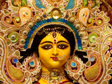Durga Maa imajı, Durga Maa Hindu tanrısıdır. Durga Puja, Hindistan 'ın Batı Bengal kentindeki en ünlü festivallerden biridir. Durga Puja, Kolkata ile ünlüdür. Fotoğraf Hindistan 'da Kolkata' da çekildi..