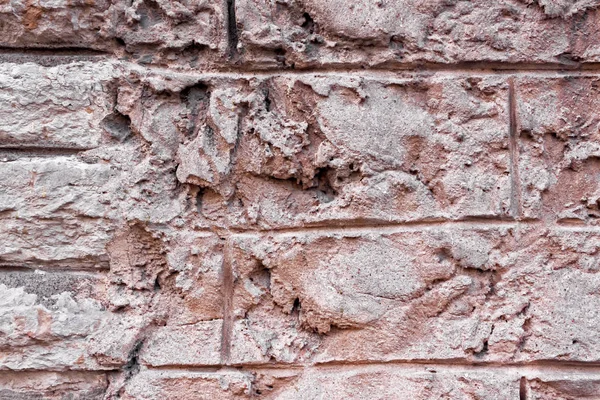 Patrones en una vieja pared de ladrillo — Foto de Stock