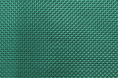 Plastik dizgilerin koyu renkli, soyut iç içe geçmiş dokusu