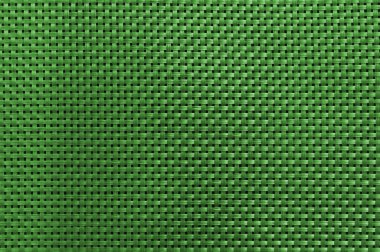 Plastik dizgilerin koyu yeşil iç içe geçmiş dokusu