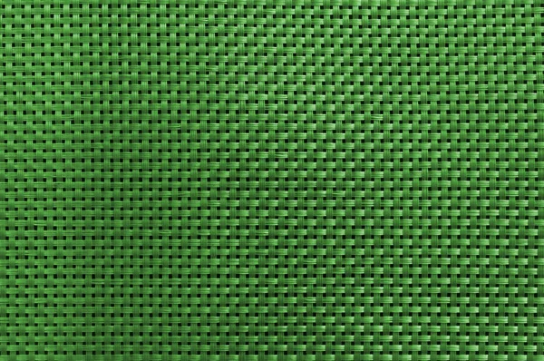 濃い緑色の抽象的なプラスチックの糸の織り込み — ストック写真