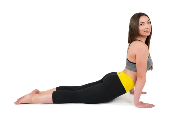 Portrait of a beautiful sports girl on a white background — Stock Photo, Image