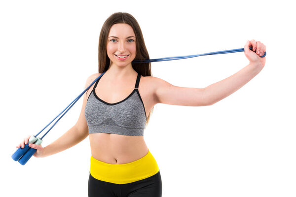 Портрет красивой спортивной девушки на белом фоне
