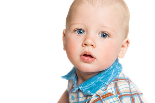 Beyaz bir arka plan üzerinde güzel bir çocuk portresi. Çocuğun yüzü portre — Stok fotoğraf