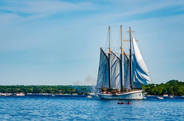 Single Tall Ship sailing among other boats — Stockfoto