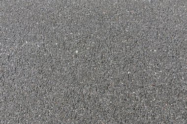 Koyu gri yapısal asfaltın arkaplanı