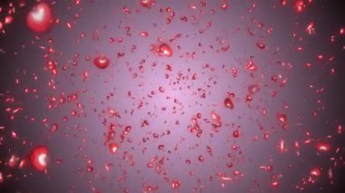 Birçok kırmızı kalp parçacığı uçar