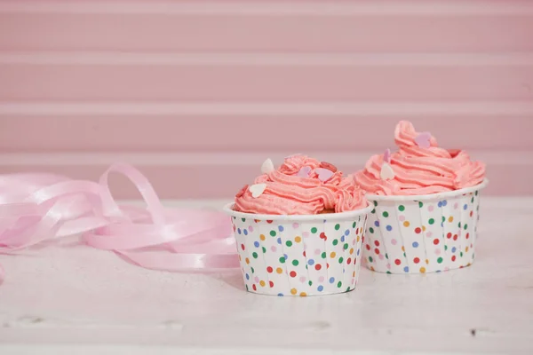 Beautiful cupcake with cream and hearts — Stock Photo, Image