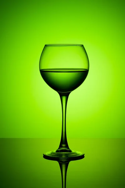 A glass on a gradient background — Stock Photo, Image
