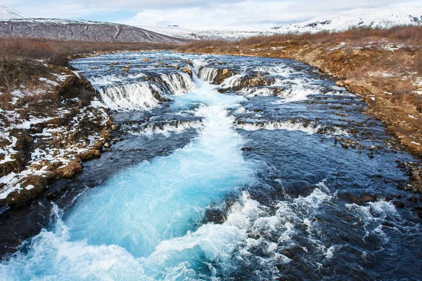 Blue water fall along river,Bruarfoss waterfall — Stock Photo, Image