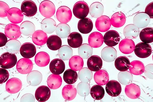 Colourful balloons, pink, white, red, streamers isolated — Stock Photo, Image