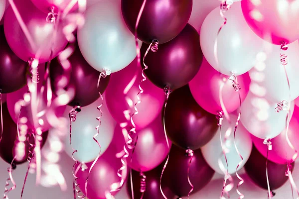 Colourful balloons, pink, white, red, streamers isolated — Stock Photo, Image