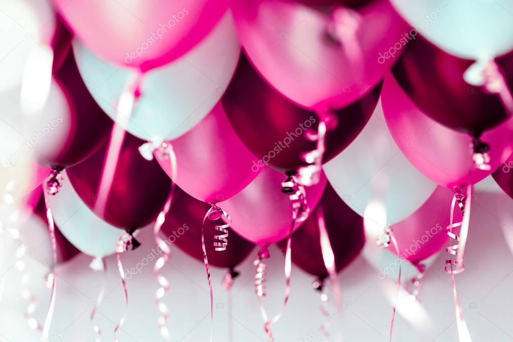 colourful balloons, pink, white, red, streamers isolated