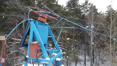 Sürükle Asansör, teleferik, mekanizma asansörleri çevresinde büküm