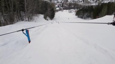 Sürükle Asansör, teleferik, mekanizma asansörleri çevresinde büküm