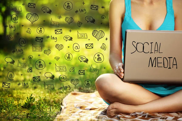 Young woman with laptop on green grass park, infographic — Stock Photo, Image