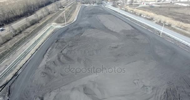 Outdoor anthracite warehouse, finished products, heaps of coal — Stock Video