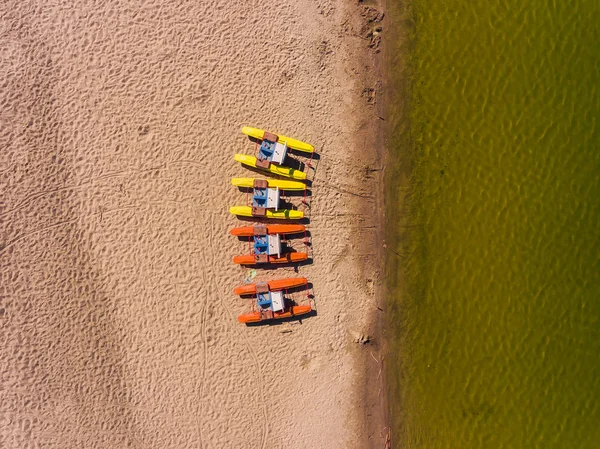 Panorama aerial view on the beach, catamarans, water bicycle