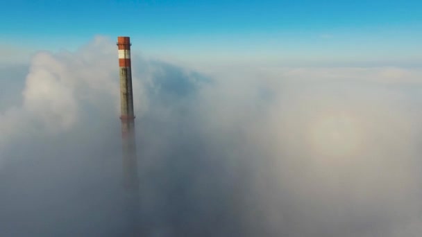 Aerial View. Flying in fog, fly in mist. Aerial camera shot. Flight above the clouds towards the sun. Misty weather, view from above. — Stock Video