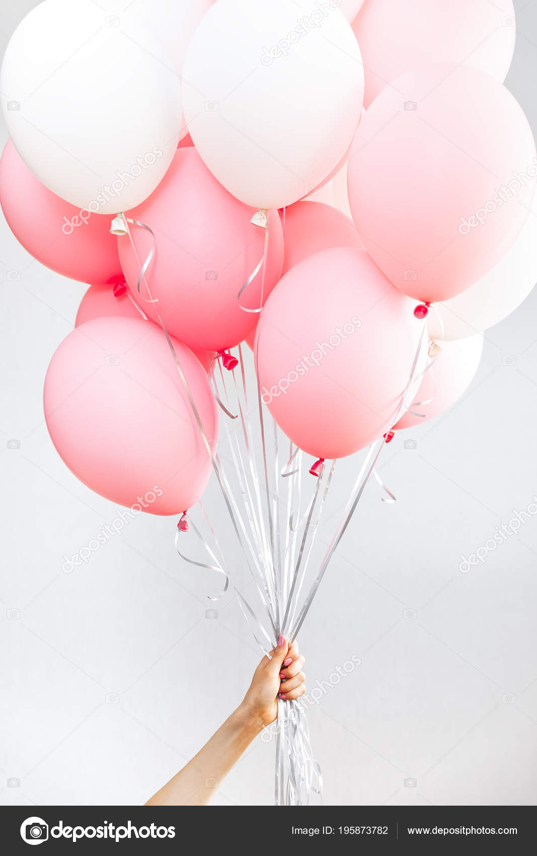 Colourful balloons, pink, white, streamers. Helium Ballon floating