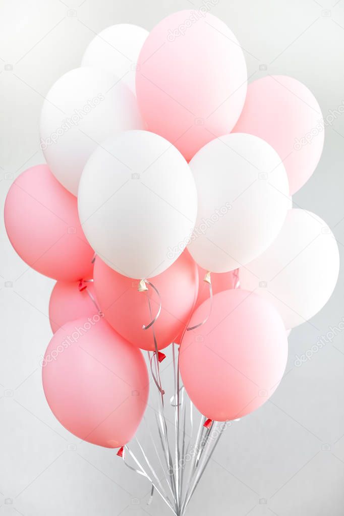Colourful balloons, pink, white, streamers. Helium Ballon floating in birthday party. Concept balloon of love and valentine