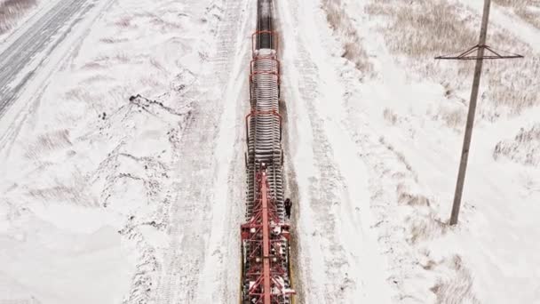 Vista Aérea Uhd Máquina Construção Ferroviária Funciona Inverno Máquina Colocação — Vídeo de Stock