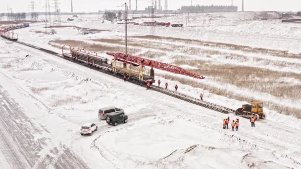 Aerial View Uhd Vasúti Építőipari Gép Működik Télen Vasúti Sínfektető — Stock videók
