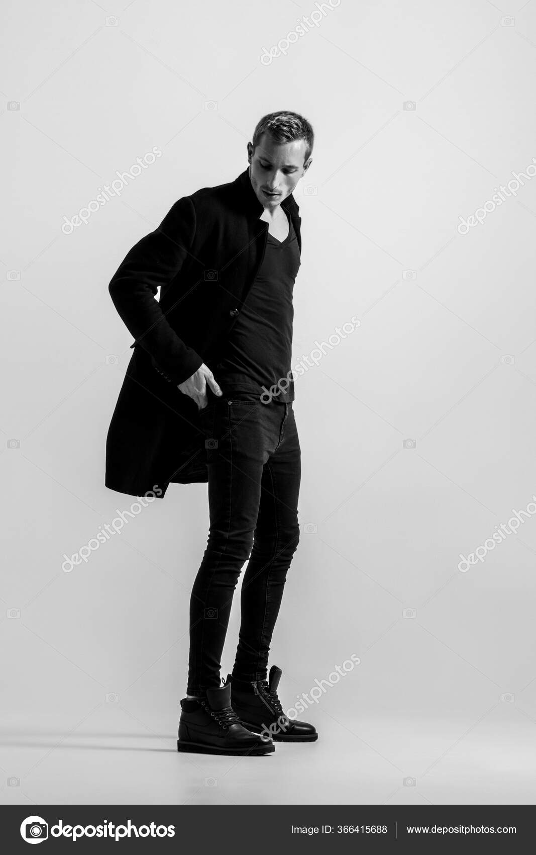Man Half Face Young Handsome Elegant Model With Open Suit Coat Skinny  Necktie Poses On Landscape Black And White On Grey Background Stock Photo,  Picture and Royalty Free Image. Image 62363526.