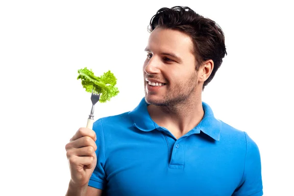 티셔츠를 남자는 배경에 떨어져 바라봅니다 식사와 채식에 — 스톡 사진