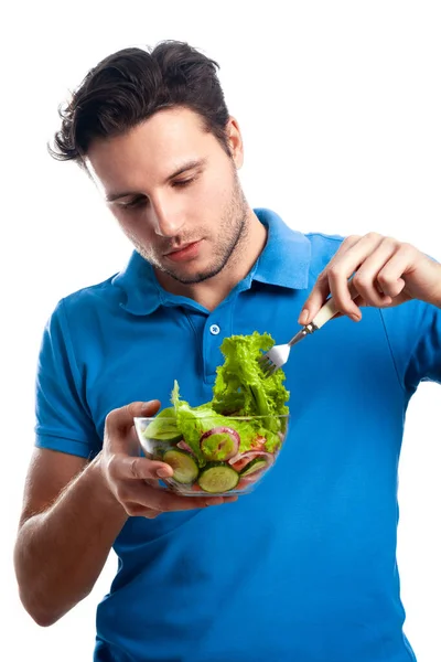 Mann Blauen Shirt Mit Salat Isst Ein Salatblatt Auf Einer — Stockfoto