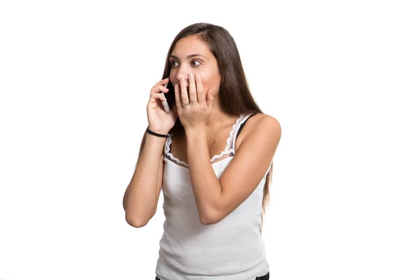 Belle jeune fille parlant au téléphone isolé sur fond blanc — Photo