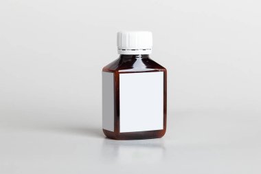 Beyaz hap kutusu. Plastik şişeler. Uyuşturucu kutusu maketi. Tıbben boş karton. Modelleme. İlaç şişesi.