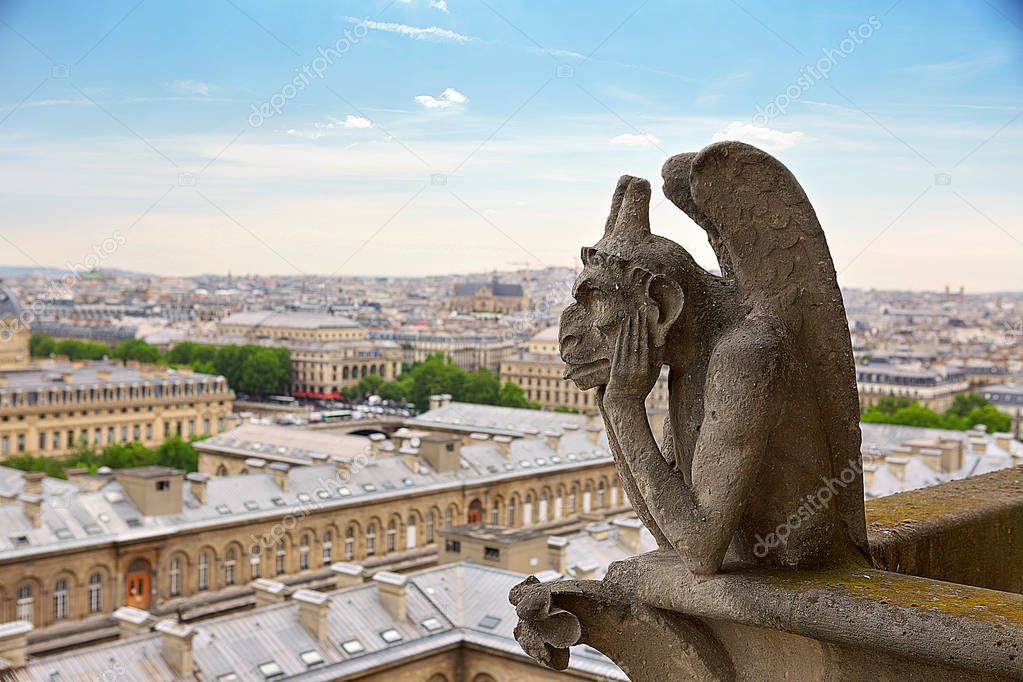 Notre-Dame Cathedral Paris, gothic gargoyle watching to the town