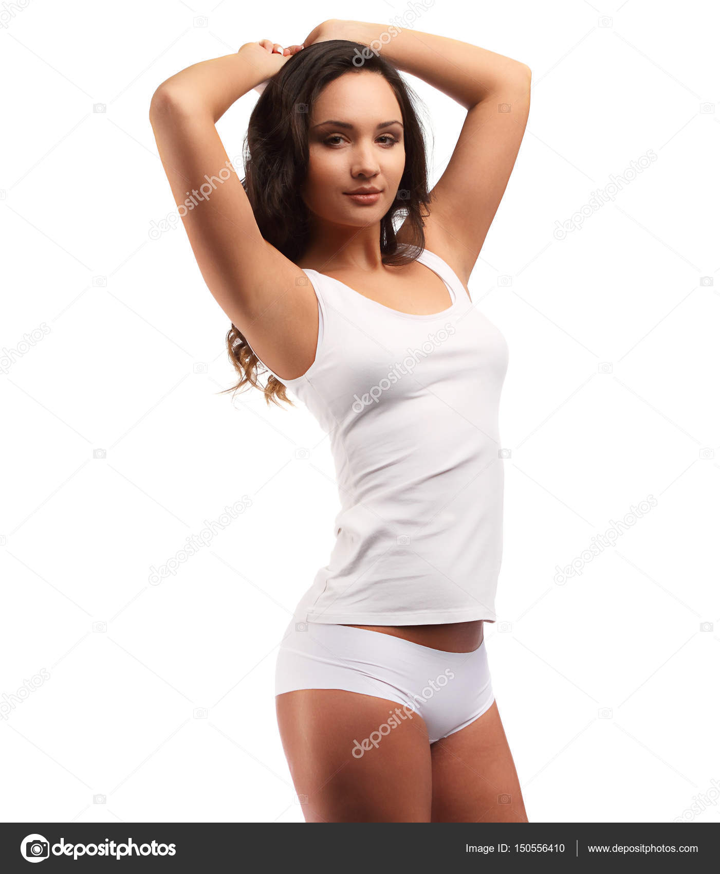 Woman with tanned skin and curly hair in white cotton panties and tank  isolated on white, hands up to head Stock Photo by ©fenixlive 150556410