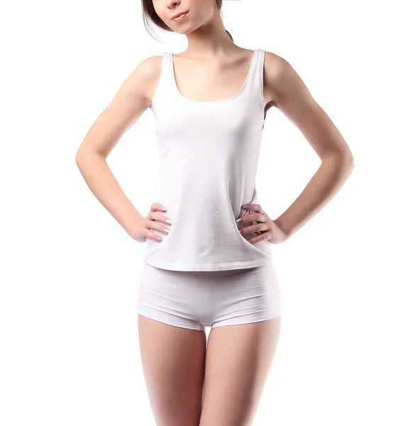 Mladá žena tělo bílé bavlněné kalhotky a tričko, ruce na pás, k nepoznání — Stock fotografie