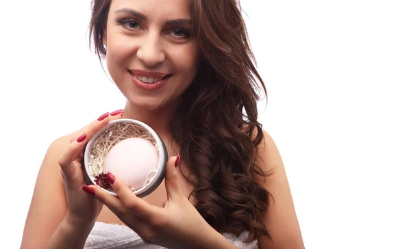 Beautiful brunette Woman holding round pink soap in box, girl portrait with curly hair — Stock Photo, Image