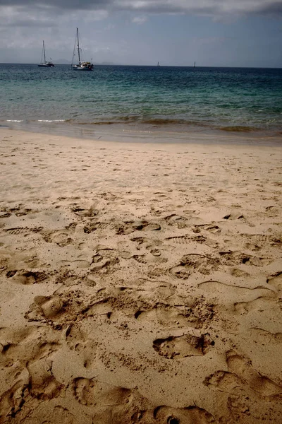 Piasek na plaży na wyspie Lanzarote, Wyspy Kanaryjskie, Hiszpania — Zdjęcie stockowe