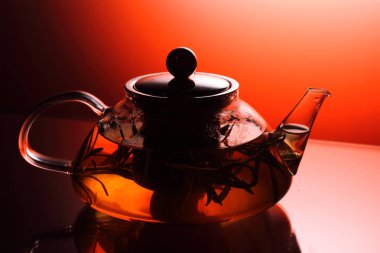 Çay saati - orange ile ışıklı çaydanlık bitki çayı, atış studio ile