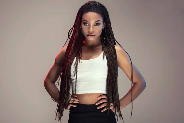 Young beautiful girl with braids. — Stock Photo, Image