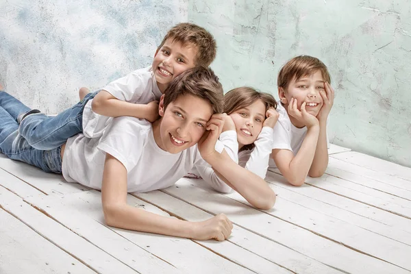 Happy children in jeans. — Stock Photo, Image