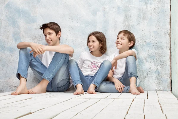 Happy children in jeans. — Stock Photo, Image