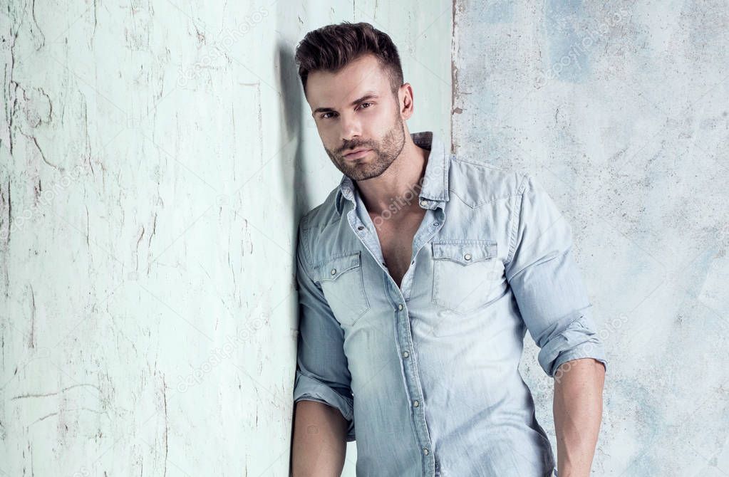 Handsome man posing in studio.