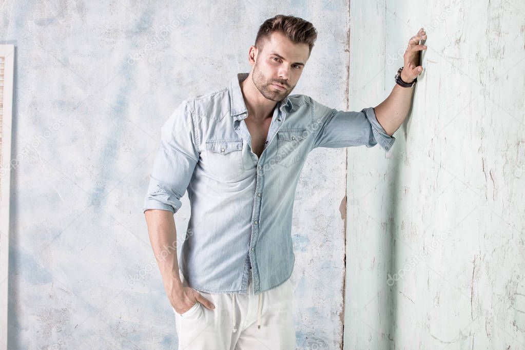 Handsome man posing in studio.