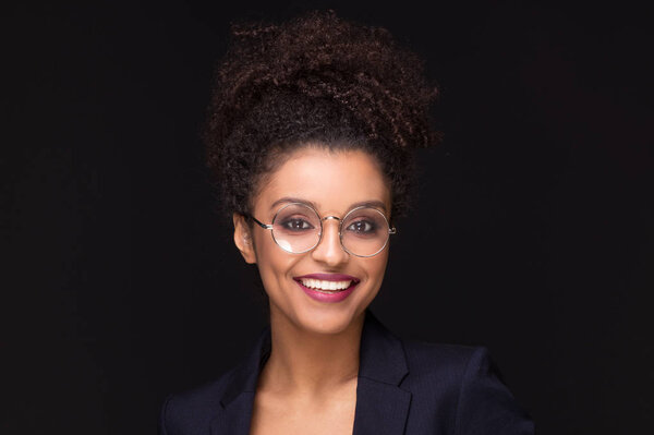 Afro woman with toothy beautiful smile.