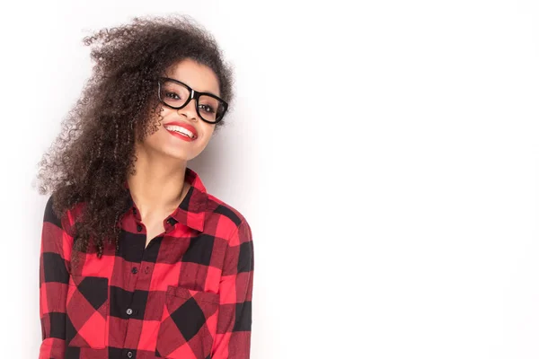 Happy afro girl in red checkered shirt. — Stock Photo, Image