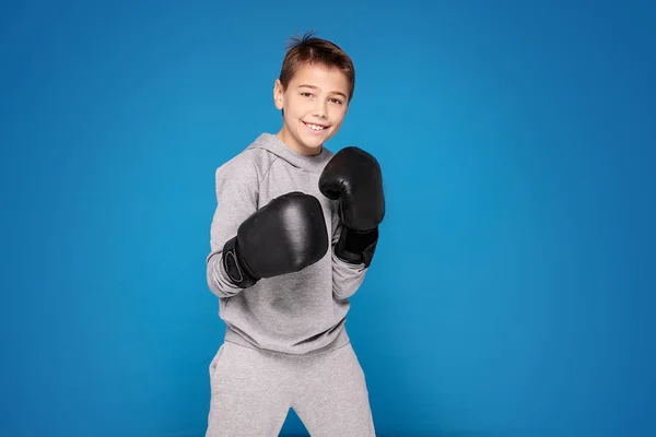 Young child sportsman in boxing gloves. — Stock Photo, Image