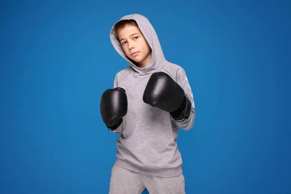 Young child sportsman in boxing gloves. — Stock Photo, Image