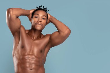 Fit african man with naked torso.
